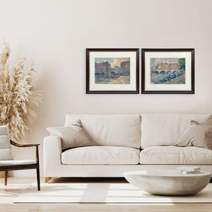 ARTualize is the only art gallery in Singapore that lets you rent paintings for your home.  This is an image of a modern living room with a sofa and coffee table and two beautiful oil on paper paintings of Paris on the wall.