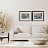 Two paintings hanging in a modern living room.