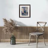 The oil painting Streets of Paris I displayed in a cosy corner. 